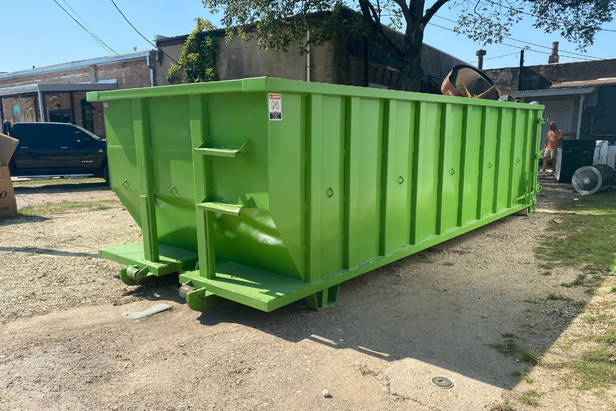 Green dumpster bin